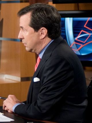 449px-Chris_Wallace_while_doing_an_interview_on_Fox_News_Sunday
