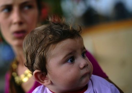 RomaChildChristopheSimonAFPGetty