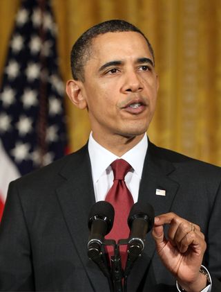 OBAMA0318AalexWong:Getty