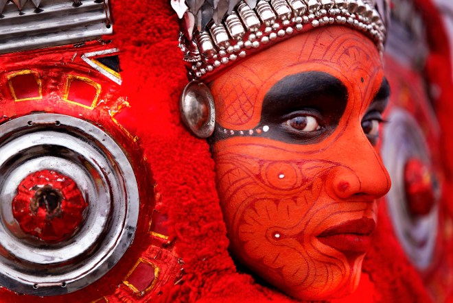 Theyyam Dancer Performs At Onam Festival Celebrations