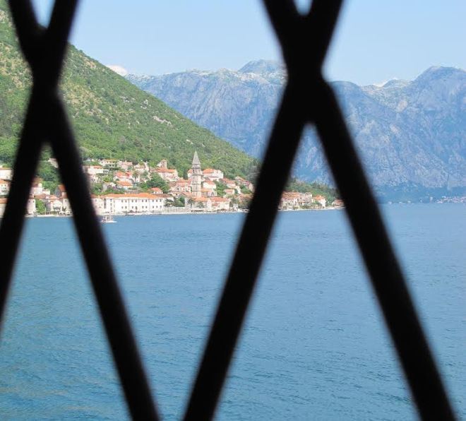 View of Perast, Montenegro from man-made island of  Roman Catholic Church Gospa od Skrpjela, June 23, 2014, 3 PM